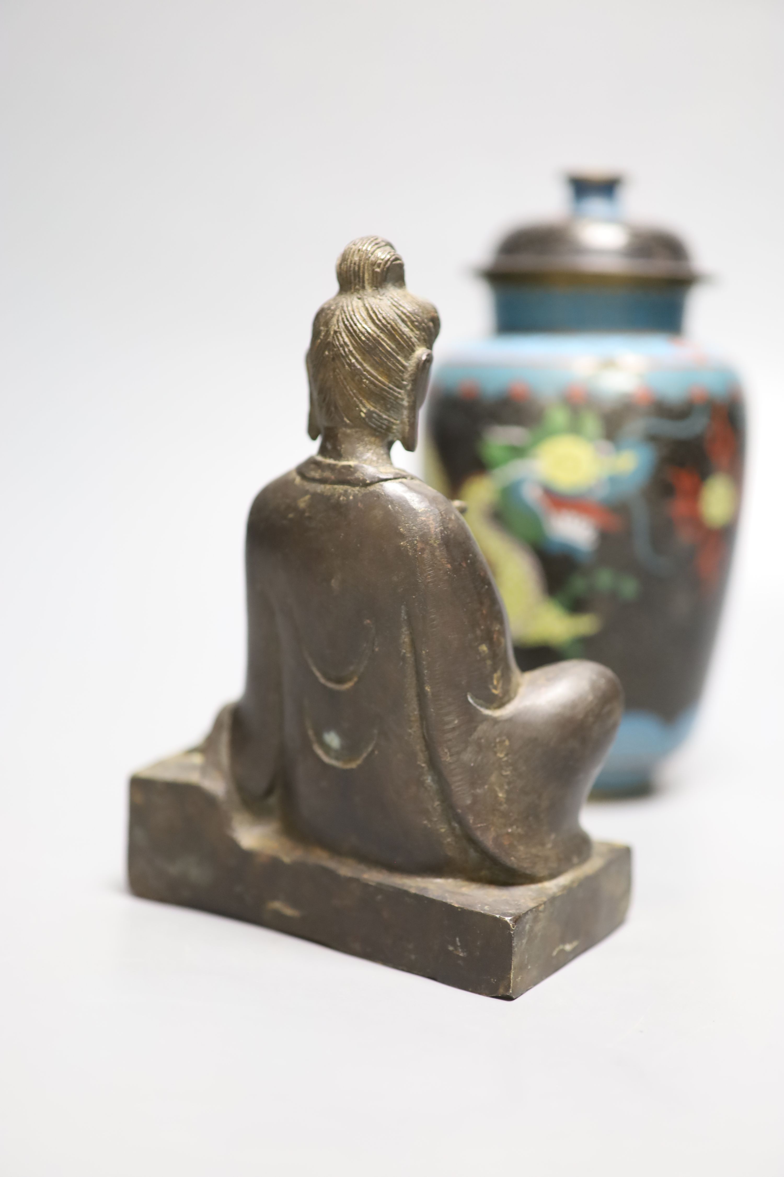 A Chinese bronze Buddha, height 17cm, a deity and cloisonne jar and cover